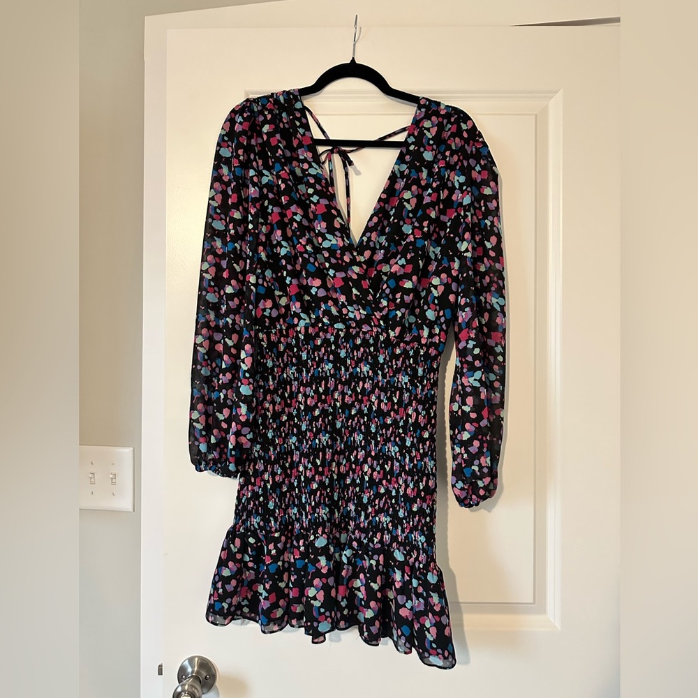 Black mini dress with pink and blue accents